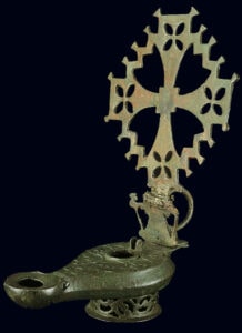 Large copper-alloy lamp from Egypt, with openwork handle in the form of a cross