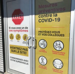 COVID-19 preventative signage at the site entrance at Lamaque, Quebec